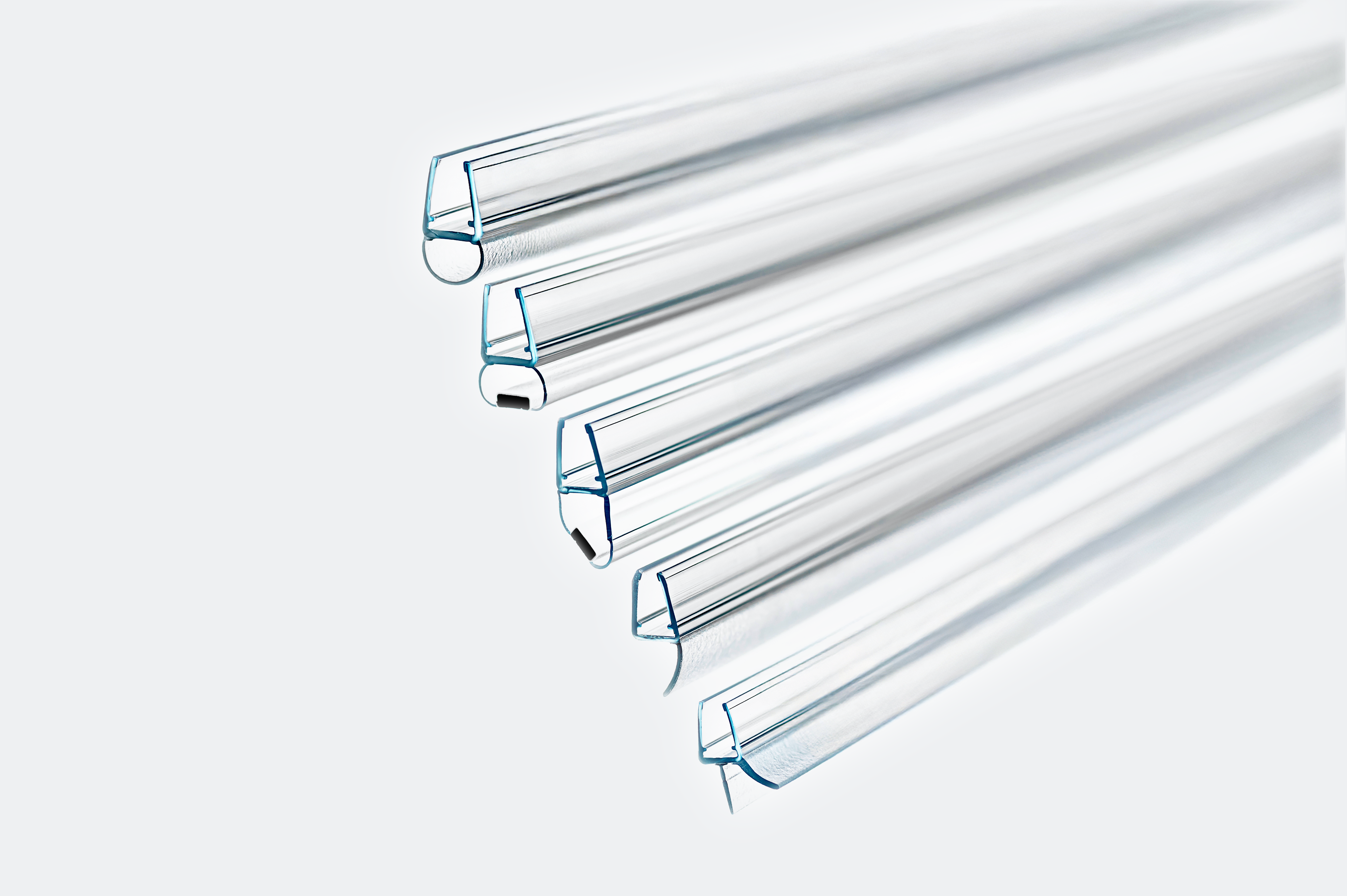 Cross-section of vertically stacked shower seal profiles