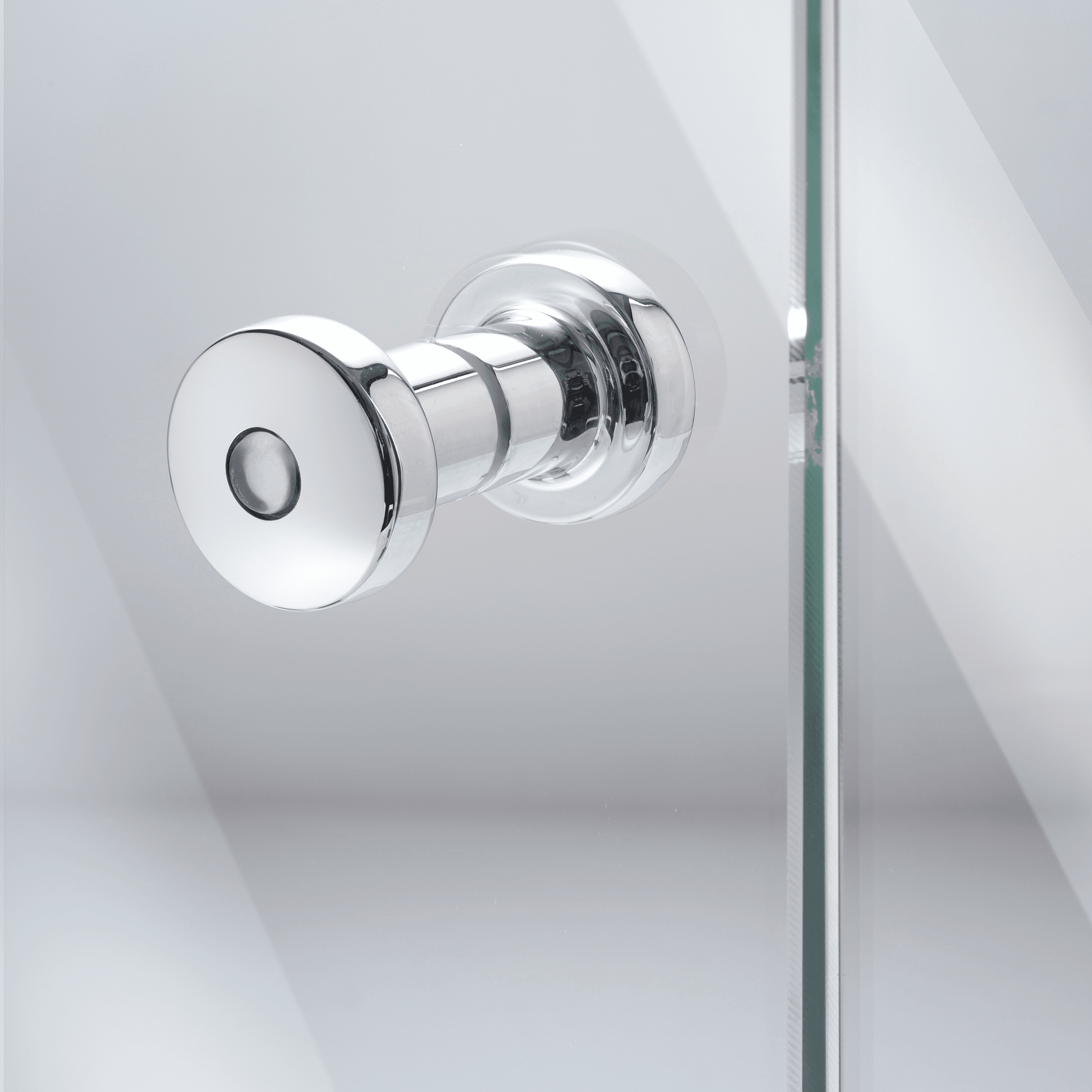 Shower door handle in chrome on a glass door